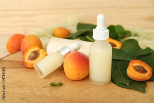 Bottles of cosmetic oil wit...