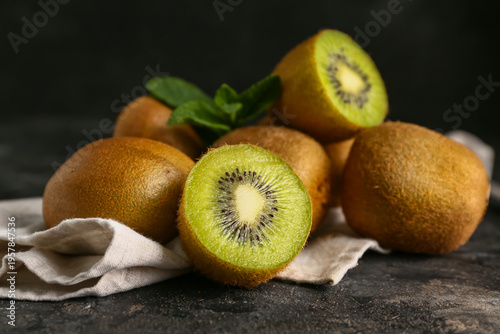Fresh kiwi and mint on blac...