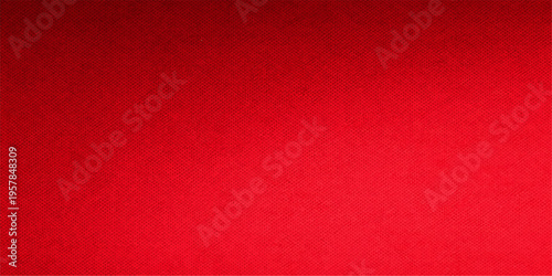 A dark red vintage grunge paper and textured fabric material background with a rough old textile pattern design for a blank Christmas wallpaper backdrop