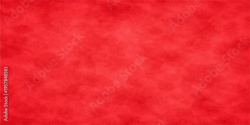 Vintage red paper and grunge fabric texture background featuring a rough old canvas pattern with a blank retro material surface design for a Christmas wallpaper backdrop
