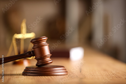 Judge's gavel on light tabl...