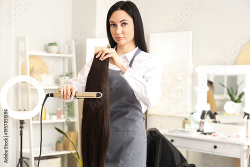 Female hairdresser with str...