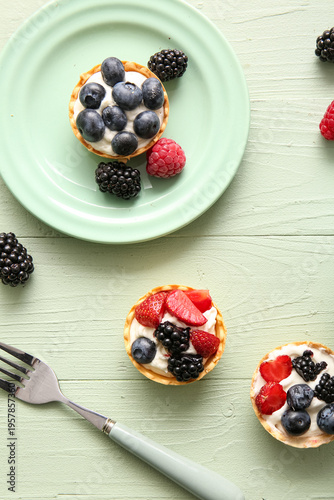 Tasty tartlets with whipped...