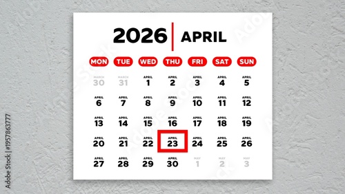 The date April 23rd marked with a red cursor on the wall calendar 2026