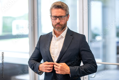 Business boss portrait of man. Successful business. Success entrepreneur. Office manager with business suit. Successful businessman in office. Professional ambitious business man