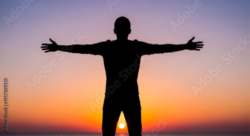 Silhouette of a Man Embracing the Sunset with Open Arms.