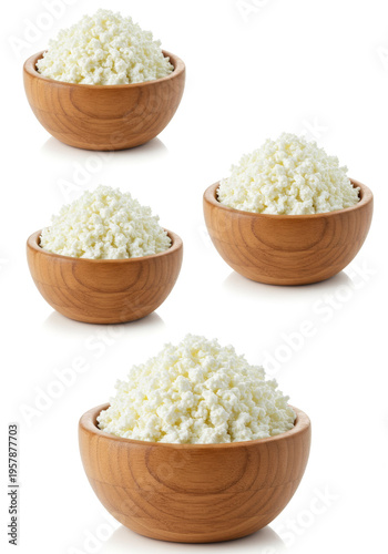 Fresh Cottage Cheese in Wooden Bowls on a White Background