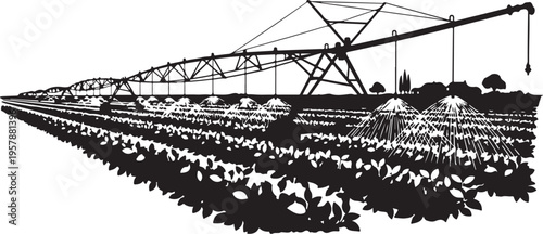 Agricultural irrigation system in a vast field at sunset