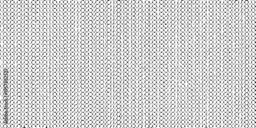 Close up of a textured knitted fabric with a repeating pattern