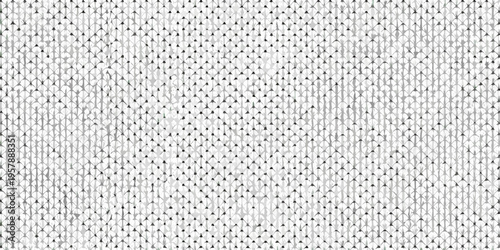 Close up of a textured woven fabric with a repeating pattern