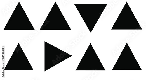 A collection of black triangles arranged on a plain white background
