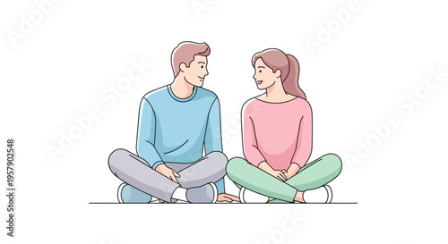 Young man and woman sitting cross-legged talking