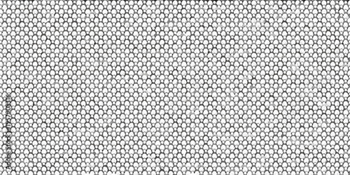 Close up view of a textured bubbly surface in grayscale