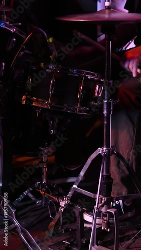 A rock band performs in a nightclub