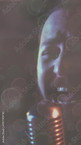 Vertical video: Drummer tapping cuing singer singing into metal mic to start music bokeh over stage