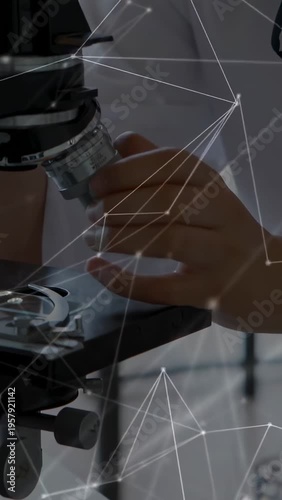 Vertical video: Student turning lens tuning focus peering overlaying hands and test tubes for lab