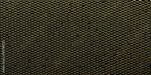 Close up of a golden honeycomb pattern against a dark background