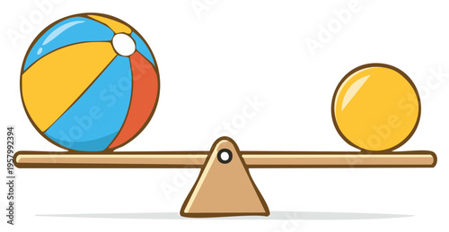 Colorful beach ball and small yellow sphere balanced on a wooden seesaw