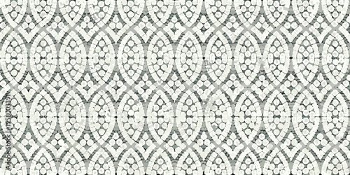 Intricate geometric mosaic pattern with repeating teardrop shapes