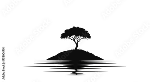 Silhouette of a solitary tree on a small island reflected in water.