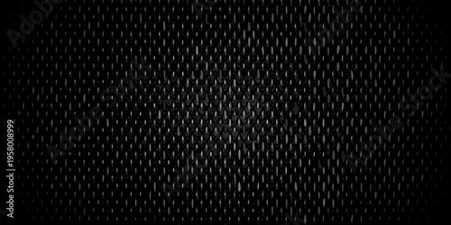 Close up of a dark textured surface resembling woven material