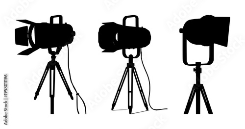 Solid black silhouette of a vintage theatrical spotlight on a stand, film noir aesthetic, precise edges, white background. set with simple line art design featuring sketches, drawings, vector graph...