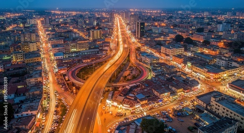 Vibrant Urban Landscape With Illuminated Highways At Dusk