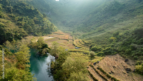Obraz na plátně Scenic view of the valley with rice fields and river in Hang Than Lim, Yen Minh, Ha Giang, Vietnam
