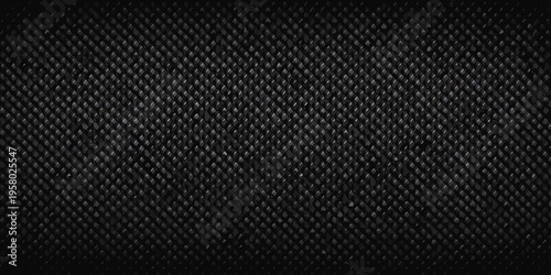 Detailed close up of a dark textured carbon fiber material background