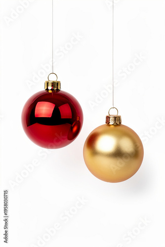 Red and Gold Christmas Baubles Hanging on String Isolated on White Background