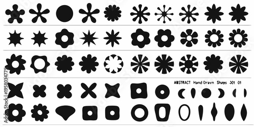Collection of abstract hand drawn black shapes arranged in neat rows