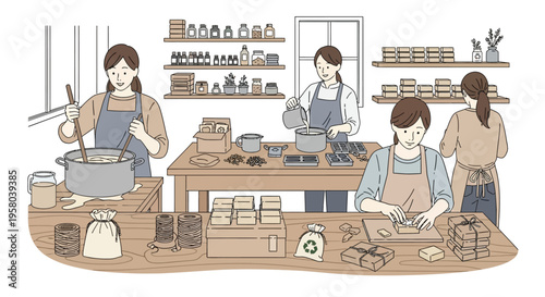 Four people working together in a workshop creating products.