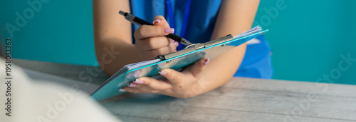 Doctor Prescribing Medication to a Patient