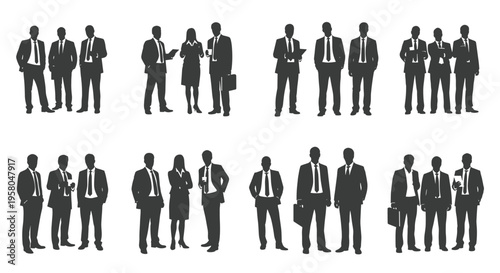 Business people standing in formal wear.
