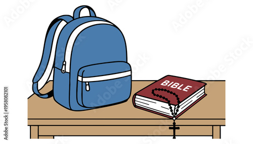 A blue backpack and a bible on a wooden school desk