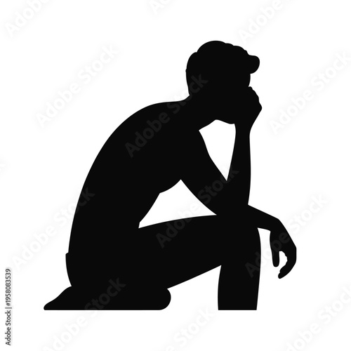 A silhouette of a man sitting in a contemplative pose