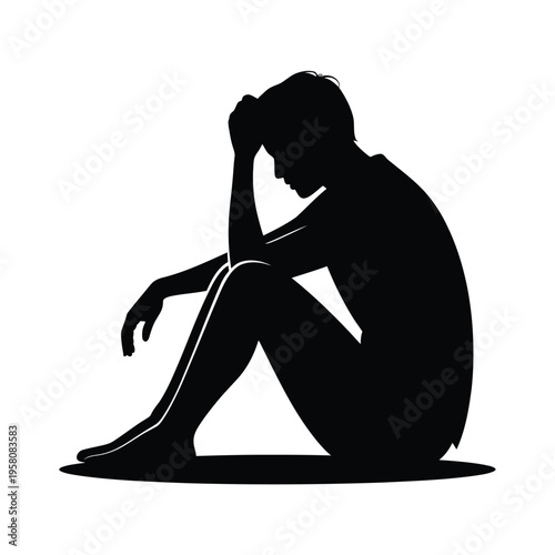 A silhouette of a person sitting in a contemplative pose