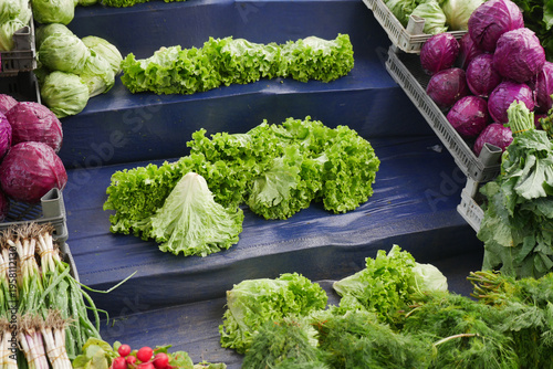 Fotografie Fresh vegetables at a local market in the morning