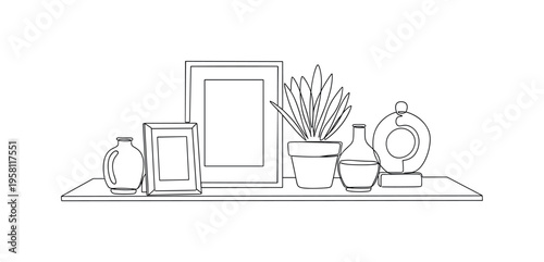 Personal Decor Arrangement. Minimalistic one-line drawing table with framed photo, plant and decorative objects representing personal style, continuous single