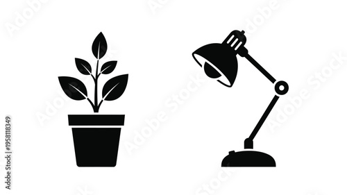 Minimalist plant and desk lamp composition in stark black silhouette