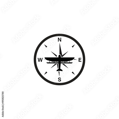 Black compass with insect on dial.