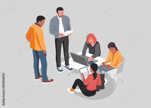 Diverse team collaborating around a table viewing a laptop screen