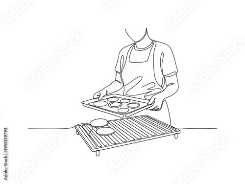 Homemade Cookies. Minimalistic one-line drawing person placing cookies on a cooling rack after baking, continuous single black line on white background, simple