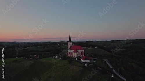 Gorca - Marijina cerkev v Malečniku - magical church near Maribor, Slovenia during sunset, Drone footage