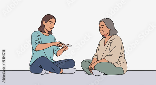 Young woman shows an older woman how to use a small device