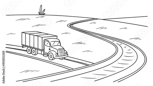 A large truck drives along a winding road in a rural landscape under a clear sky.
