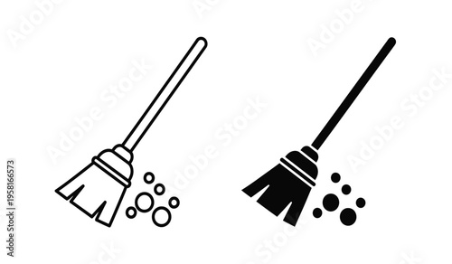 Silhouette of two brooms sweeping up debris in a simple black and white illustration