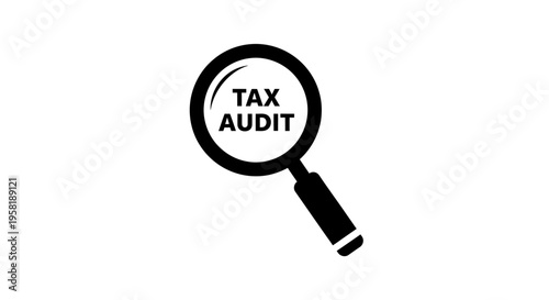 Magnifying glass with tax audit text.