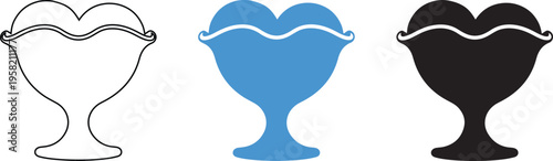 A set of three heart-shaped dessert dishes in different colors on a white background