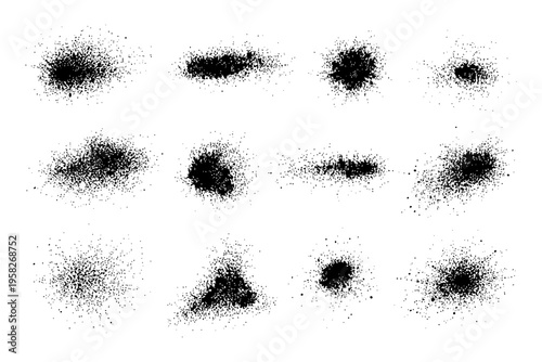 Set of black grunge spray paint splatter elements on white background.